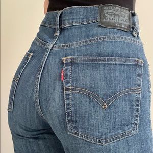 Levi’s 90s style black + silver tab straight leg jeans